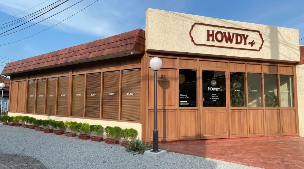 Howdy Café timber shopfront with HOWDY cafe sign on Jalan Pantai Chenang