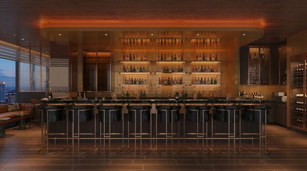 Full-length Liquid Valley bar with black stools and gold tiled shelves