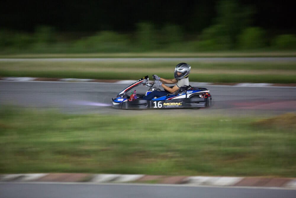 Drivers racing go-karts on the Morac Adventure Park circuit