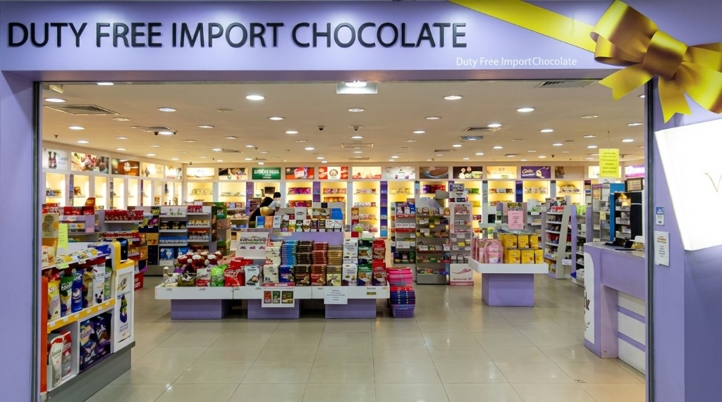 Ole Ole Cenang Mall storefront with DUTY FREE IMPORT CHOCOLATE fascia