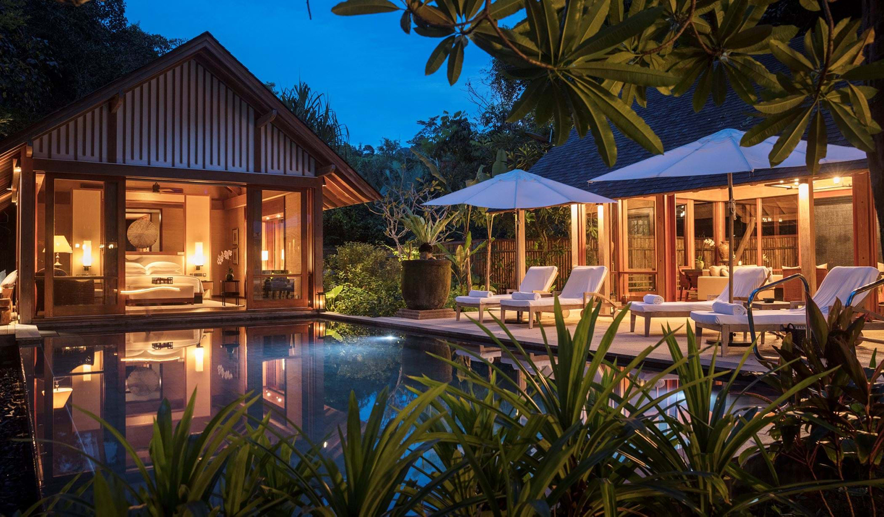 Beach villa and white sand along Teluk Datai shoreline